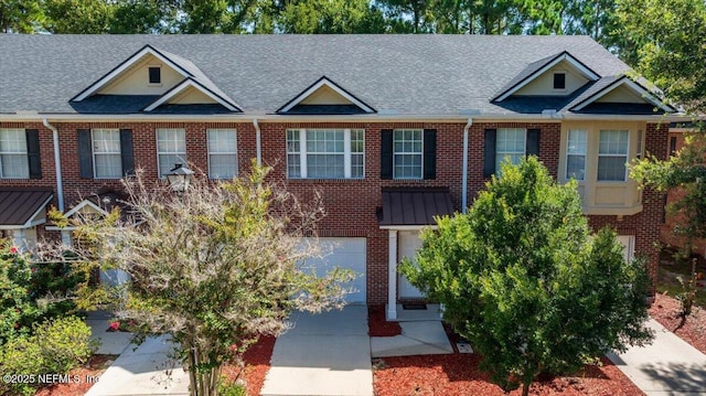 1515 Landau Rd, Jacksonville, FL 32225 - view of front facade featuring brick siding and roof with shingles
