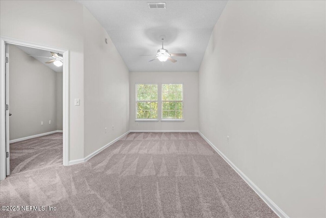 1515 Landau Rd, Jacksonville, FL 32225 - carpeted empty room with a ceiling fan and vaulted ceiling