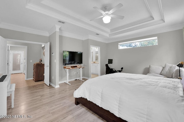 1728 Dartmoor Ln, Ponte Vedra, FL 32081 - bedroom featuring a tray ceiling, light wood-style floors, crown molding, ceiling fan, and ensuite bath