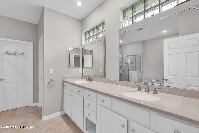 1728 Dartmoor Ln, Ponte Vedra, FL 32081 - full bath featuring double vanity, a stall shower, and tile patterned floors