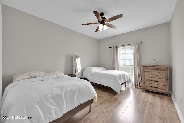 1728 Dartmoor Ln, Ponte Vedra, FL 32081 - bedroom with light wood-style flooring and ceiling fan