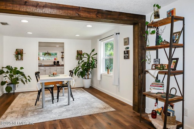 8360 Mudlake Rd, Macclenny, FL 32063 - dining room featuring dark wood-style flooring, recessed lighting, and beam ceiling
