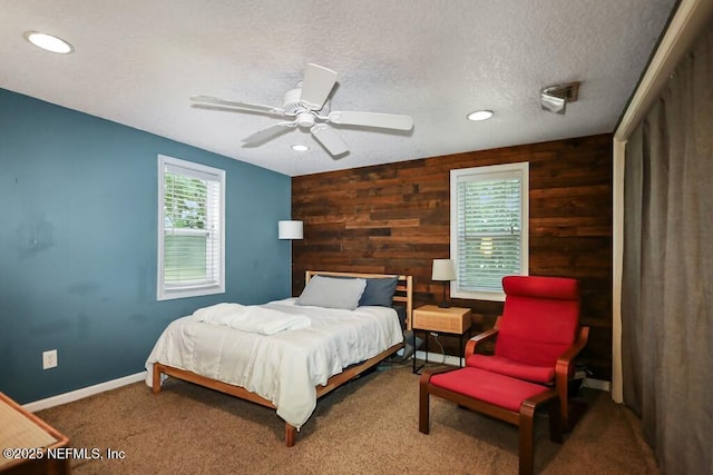 8360 Mudlake Rd, Macclenny, FL 32063 - carpeted bedroom with wooden walls, recessed lighting, a textured ceiling, and ceiling fan