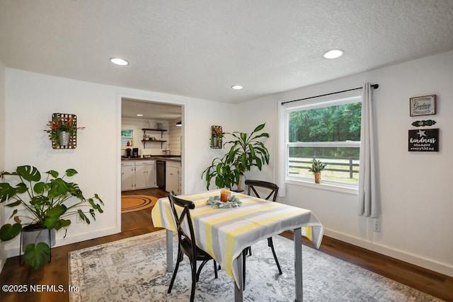 8360 Mudlake Rd, Macclenny, FL 32063 - dining area featuring dark wood-style floors, recessed lighting, and a textured ceiling