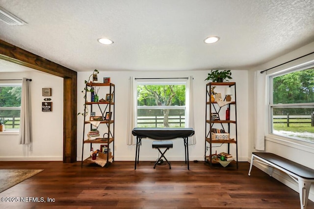 8360 Mudlake Rd, Macclenny, FL 32063 - sitting room with recessed lighting, dark wood-style flooring, plenty of natural light, and a textured ceiling
