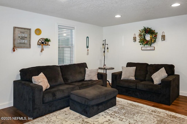 8360 Mudlake Rd, Macclenny, FL 32063 - living area with wood finished floors, recessed lighting, and a textured ceiling