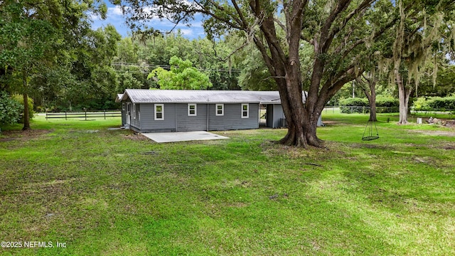 8360 Mudlake Rd, Macclenny, FL 32063 - view of front of home featuring a patio area and a metal roof