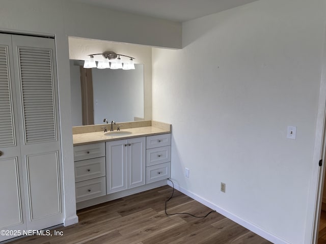 32 Ocean Palm Dr S Unit 320, Flagler Beach, FL 32136 - bathroom featuring vanity, wood finished floors, and a closet