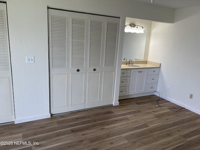 32 Ocean Palm Dr S Unit 320, Flagler Beach, FL 32136 - bathroom featuring a closet, vanity, and wood finished floors