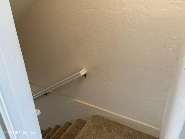32 Ocean Palm Dr S Unit 320, Flagler Beach, FL 32136 - stairs featuring a textured wall