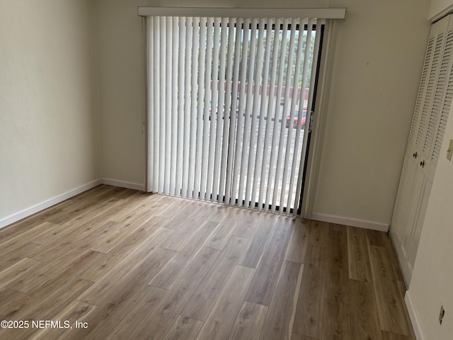 32 Ocean Palm Dr S Unit 320, Flagler Beach, FL 32136 - empty room with wood finished floors