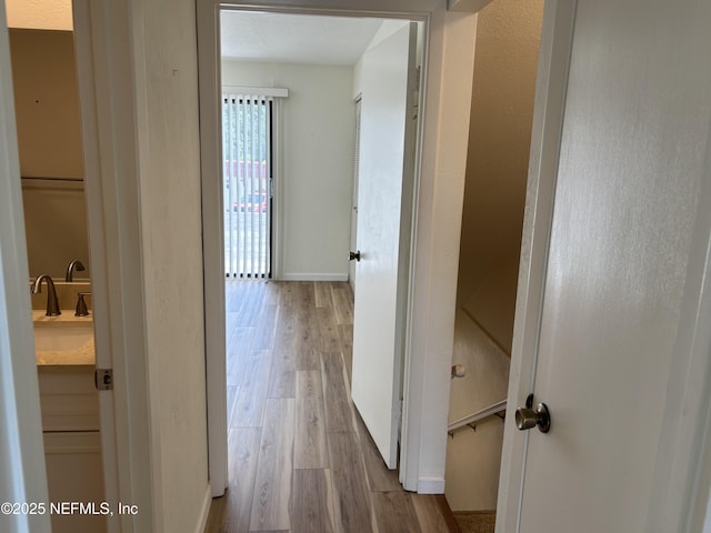 32 Ocean Palm Dr S Unit 320, Flagler Beach, FL 32136 - hall with wood finished floors and baseboards