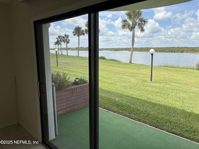 32 Ocean Palm Dr S Unit 320, Flagler Beach, FL 32136 - entryway with a water view and tile patterned flooring