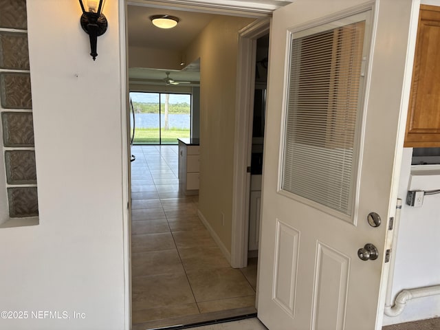 32 Ocean Palm Dr S Unit 320, Flagler Beach, FL 32136 - corridor with tile patterned floors and a water view