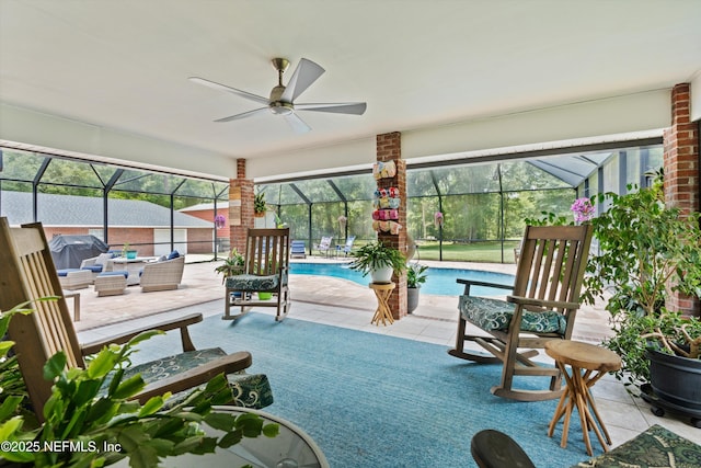 5566 Don Manuel Rd, Elkton, FL 32033 - swimming pool with outdoor lounge area, a patio area, glass enclosure, and ceiling fan