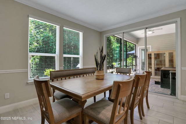 363 Latrobe Ave, Saint Augustine, FL 32095 - dining space with a ceiling fan, ornamental molding, and light tile patterned floors