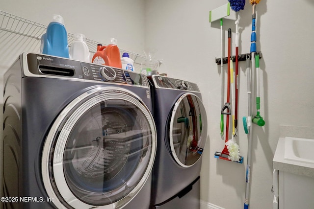 363 Latrobe Ave, Saint Augustine, FL 32095 - laundry area featuring washer and dryer and baseboards