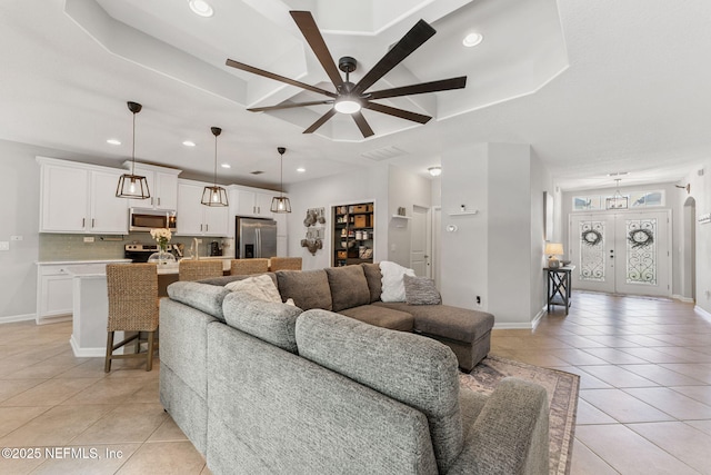 47 Mercutio Ln, Saint Augustine, FL 32092 - living area featuring light tile patterned flooring, ceiling fan, and recessed lighting