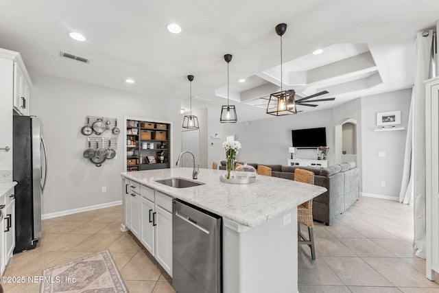 47 Mercutio Ln, Saint Augustine, FL 32092 - kitchen featuring a ceiling fan, arched walkways, stainless steel appliances, light tile patterned flooring, and recessed lighting