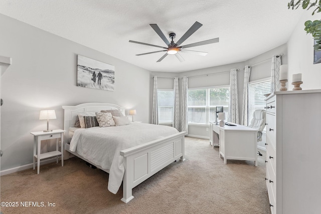 47 Mercutio Ln, Saint Augustine, FL 32092 - bedroom featuring light carpet, a textured ceiling, ceiling fan, and a desk