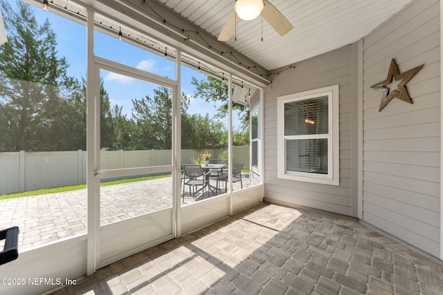 47 Mercutio Ln, Saint Augustine, FL 32092 - unfurnished sunroom featuring ceiling fan and outdoor dining space