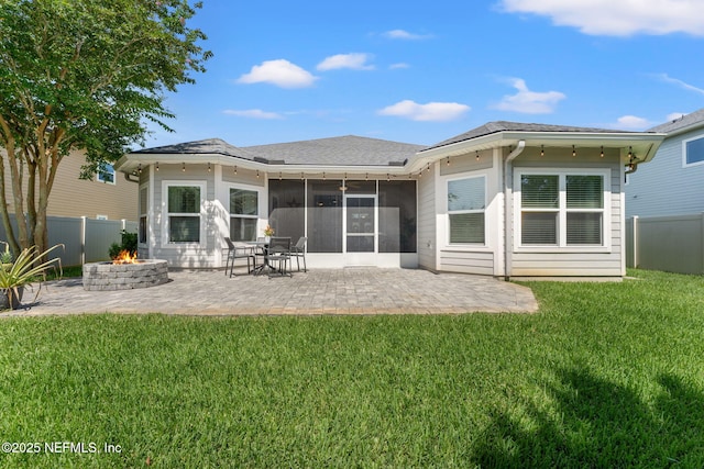 47 Mercutio Ln, Saint Augustine, FL 32092 - rear view of property featuring a fire pit, a sunroom, a patio area, a fenced backyard, and a shingled roof