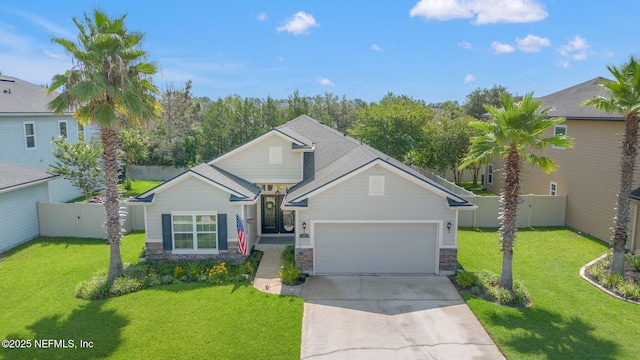 47 Mercutio Ln, Saint Augustine, FL 32092 - craftsman inspired home featuring stone siding, driveway, a fenced backyard, and a garage