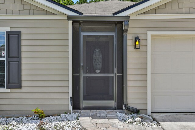 35 Root Ln, Saint Augustine, FL 32084 - entrance to property featuring a garage