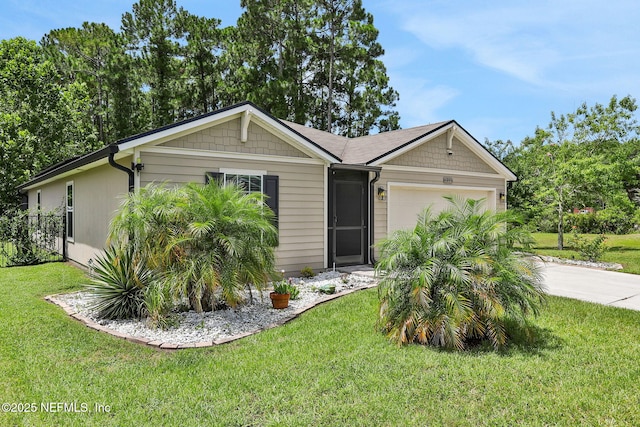 35 Root Ln, Saint Augustine, FL 32084 - view of front of home with driveway, an attached garage, and a front yard
