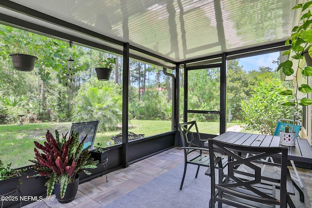 35 Root Ln, Saint Augustine, FL 32084 - sunroom featuring healthy amount of natural light and outdoor dining area
