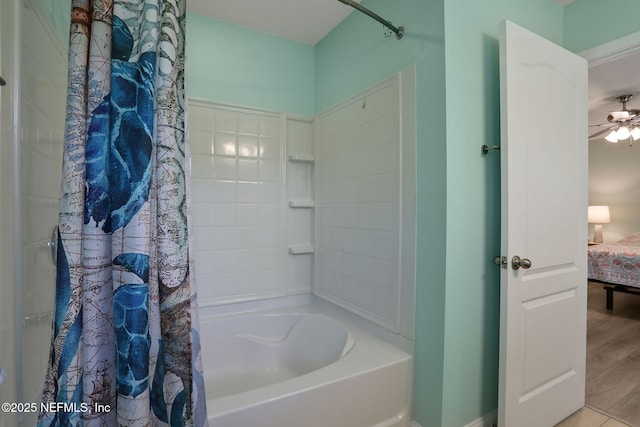 35 Root Ln, Saint Augustine, FL 32084 - ensuite bathroom with shower / bath combo, a ceiling fan, and wood finished floors