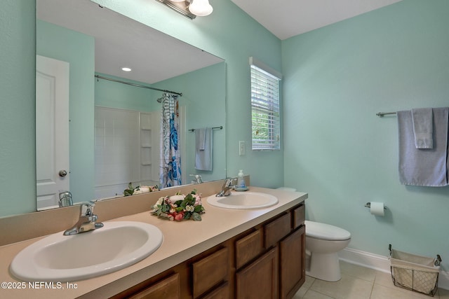 35 Root Ln, Saint Augustine, FL 32084 - full bathroom with double vanity, tile patterned flooring, and a shower with shower curtain