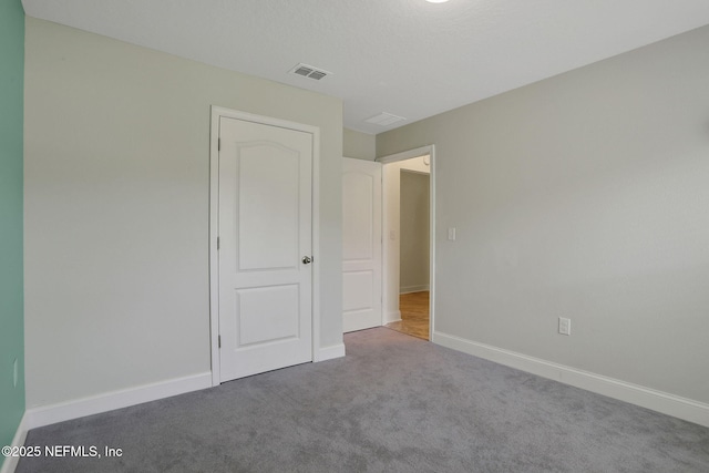 35 Root Ln, Saint Augustine, FL 32084 - unfurnished bedroom featuring carpet floors and baseboards