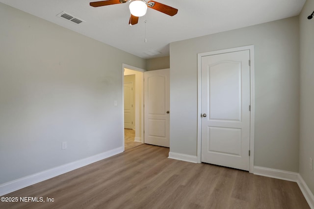 35 Root Ln, Saint Augustine, FL 32084 - unfurnished bedroom featuring wood finished floors and a ceiling fan