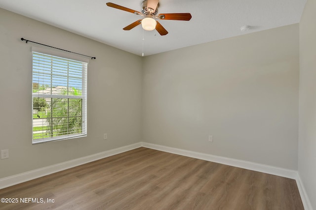 35 Root Ln, Saint Augustine, FL 32084 - spare room featuring wood finished floors, a smoke detector, and ceiling fan