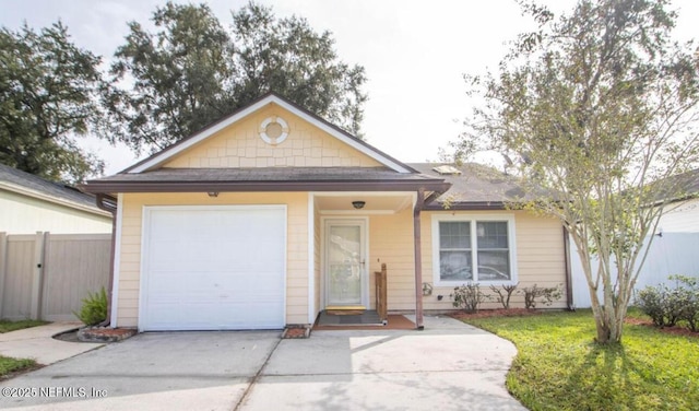 8355 Argyle Corners Dr, Jacksonville, FL 32244 - ranch-style home featuring driveway and an attached garage