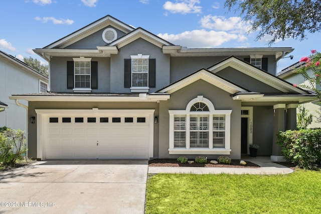 1083 Three Forks Ct, Saint Augustine, FL 32092 - view of front of home featuring stucco siding, an attached garage, driveway, and a front lawn