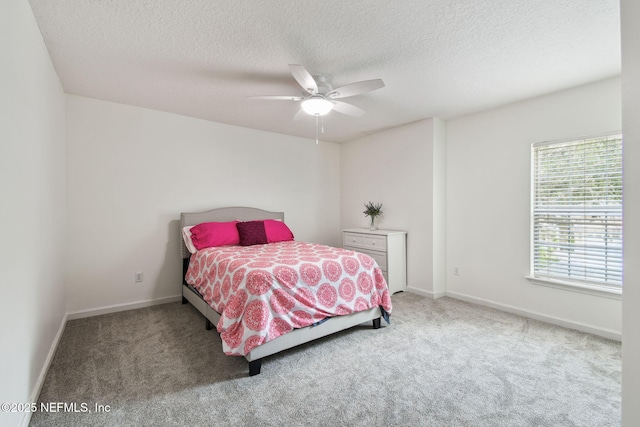 1083 Three Forks Ct, Saint Augustine, FL 32092 - carpeted bedroom featuring a textured ceiling and a ceiling fan