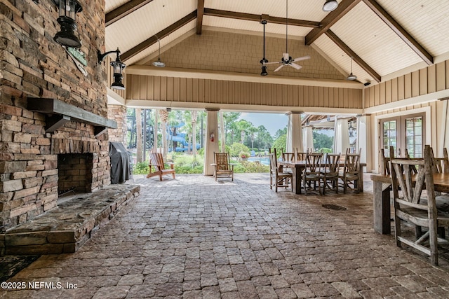1083 Three Forks Ct, Saint Augustine, FL 32092 - view of patio / terrace featuring an outdoor stone fireplace, ceiling fan, outdoor dining space, and a grill