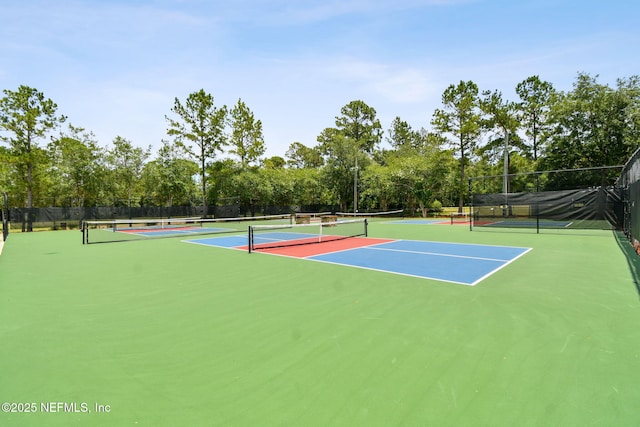 1083 Three Forks Ct, Saint Augustine, FL 32092 - view of tennis court with community basketball court and view of scattered trees