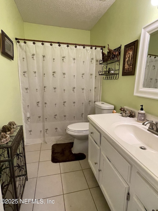 1855 N Alberta Ct, Middleburg, FL 32068 - bathroom with vanity, a textured ceiling, tile patterned flooring, and a shower with shower curtain
