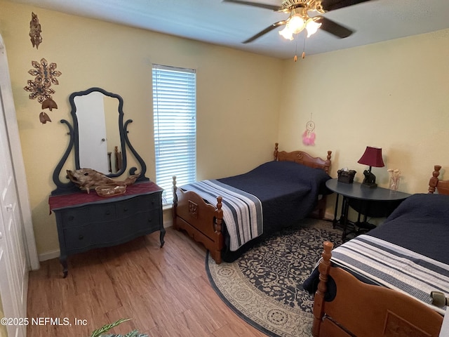 1855 N Alberta Ct, Middleburg, FL 32068 - bedroom with wood finished floors and ceiling fan