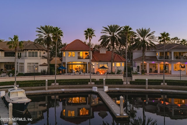 112 Harbourmaster Ct, Ponte Vedra Beach, FL 32082 - back of property featuring a tiled roof and stucco siding