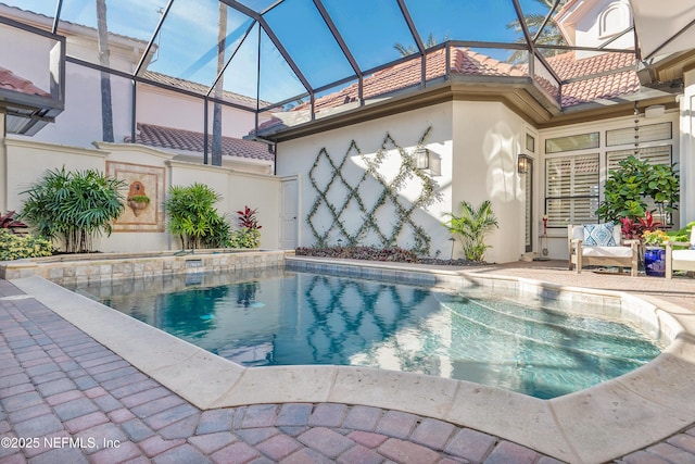 112 Harbourmaster Ct, Ponte Vedra Beach, FL 32082 - view of pool featuring glass enclosure, a patio area, and a pool with connected hot tub