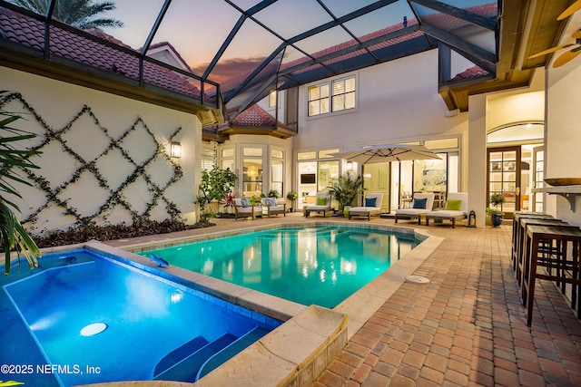 112 Harbourmaster Ct, Ponte Vedra Beach, FL 32082 - pool at dusk with a patio area and a pool with connected hot tub