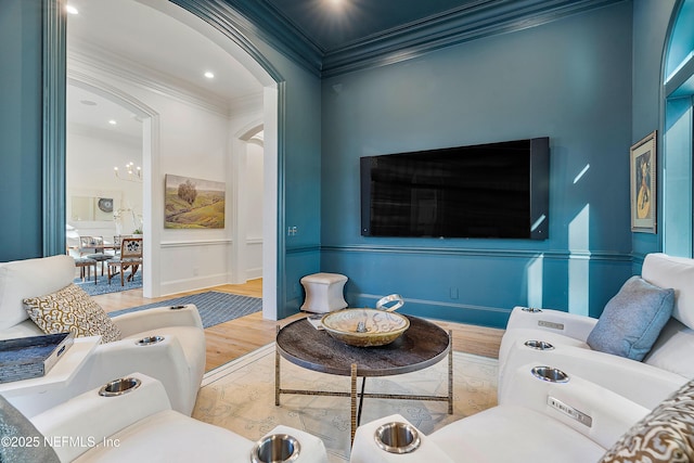 112 Harbourmaster Ct, Ponte Vedra Beach, FL 32082 - living area featuring crown molding, wood finished floors, arched walkways, a chandelier, and recessed lighting
