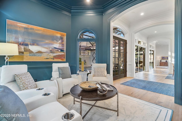112 Harbourmaster Ct, Ponte Vedra Beach, FL 32082 - sitting room with arched walkways, french doors, ornamental molding, wood finished floors, and recessed lighting
