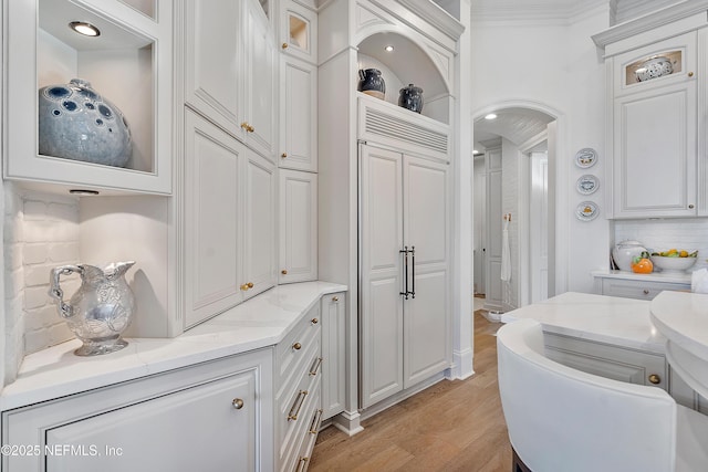 112 Harbourmaster Ct, Ponte Vedra Beach, FL 32082 - full bath featuring wood finished floors, ornamental molding, tasteful backsplash, and a shower