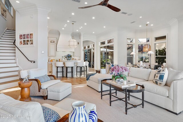 112 Harbourmaster Ct, Ponte Vedra Beach, FL 32082 - living area with a ceiling fan, light wood finished floors, recessed lighting, crown molding, and stairway