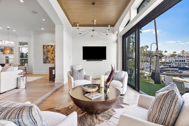 112 Harbourmaster Ct, Ponte Vedra Beach, FL 32082 - living room featuring crown molding, light wood finished floors, a chandelier, wooden ceiling, and recessed lighting